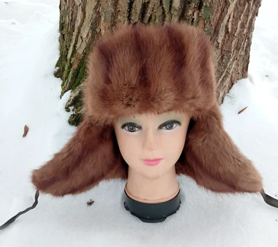 Cappello uomo invernale con paraorecchie realizzato in pelliccia marrone natu... - Immagine 1 di 4