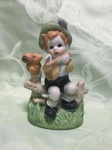 Porcelain Boy Playing Flute Sitting on Fence w/ Squirrel Figurine, 4.75" Tall - Picture 1 of 12