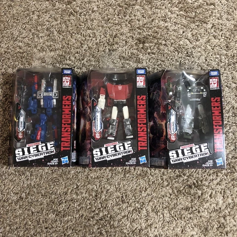 Transformers WFC War for Cybertron Siege Sideswipe Cog And Hound Hasbro Takara Cover