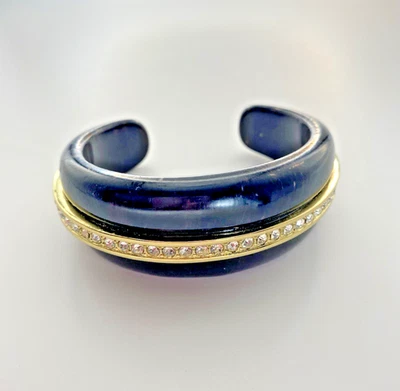 "Brazalete grueso de cristal tono dorado Anne Klein de 6,5"" - 7"" con pedrería" Foto 1 de 4