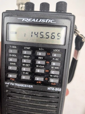Vintage Realistic HTX-202 UHF Fm Transceiver With Charger Tested  - Image 1 of 4