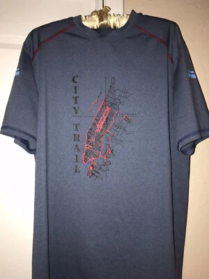 Camiseta Salomon Advanced Skin Running Talla L. Bolsillo trasero con cremallera. Azul. Usado en excelente estado Foto 1 de 4