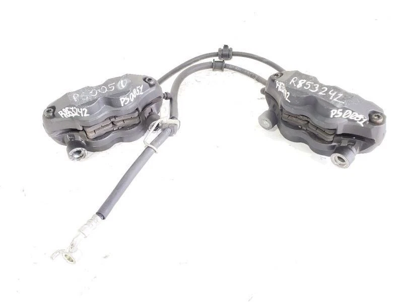 Front Calipers R 59100-41G30-999, L 59300-41G30-999 OEM 08 09 11 12 Suzuki  - Image 1 of 4