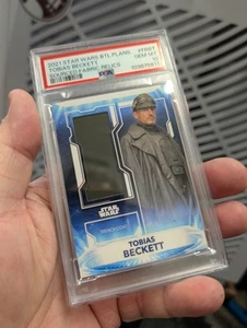 2021 Topps Star Wars Battle Plans Tobias Beckett Fabric Relic/149 🔥PSA 10 POP 1 - Picture 1 of 5