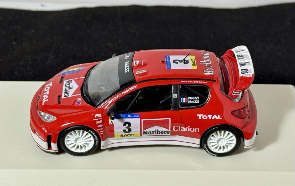PEUGEOT 206 WRC #3 G.PANIZZI-H.PANIZZI 1st RALLY CATALUNYA 2003 TRANSKIT 1:43 - Immagine 1 di 4