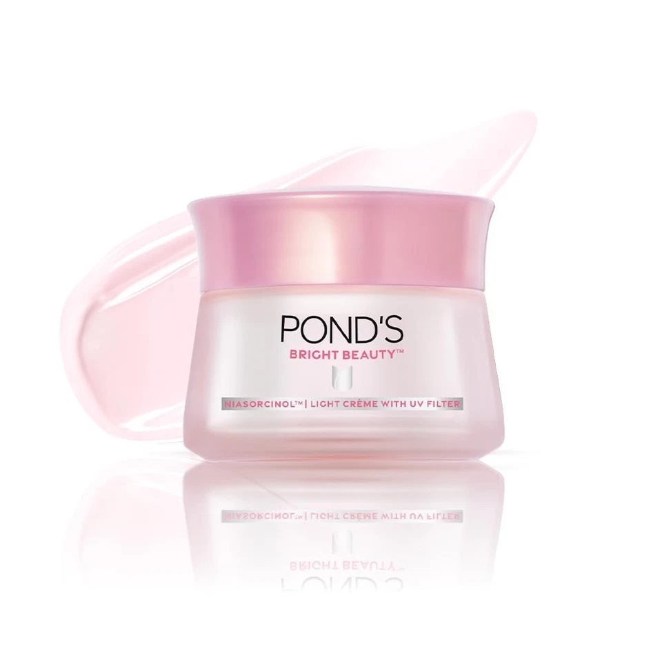 Crema ligera Pond's Bright Beauty 50 g con filtro UV niasorcinol desvanece manchas oscuras Foto 1 de 4