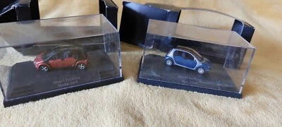 Deux Voitures miniatures  SMART FORFOUR FLAME RED et START BLUE 1/87 SMARTWARE - Photo 1/3