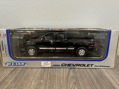 Chevrolet Silverado 1999 negro 1:18 Welly fundido a presión sin usar, en caja Foto 1 de 4