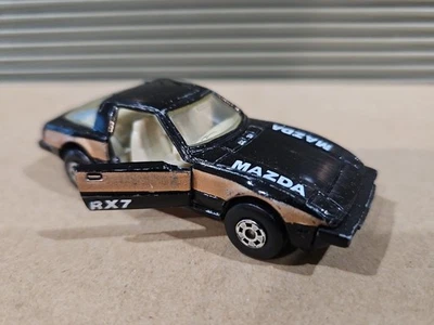 Matchbox Superfast Mazda RX-7 Negro y Dorado 1979 Nº 31 Hong Kong Lesney RX7 SF31 Foto 1 de 4