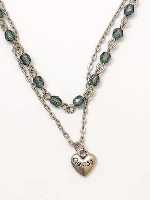 Collar en capas con colgante de corazón con cuentas azules con cable de plata GUESS para damas Foto 1 de 4