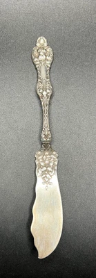 Cuchillo de mantequilla maestro de plata esterlina con flor de azahar antiguo Alvin sin monograma Foto 1 de 3