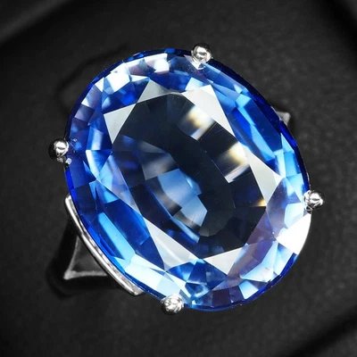Anillos de oro blanco de plata de ley 925 ovalados de zafiro azul brillante de 12,65 quilates talla 6,75 Foto 1 de 4