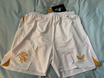 Pantalones Cortos de Entrenamiento Glasgow Rangers Juveniles GRANDES Blancos y Dorados CASTORE Escocia FÚTBOL Foto 1 de 2