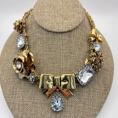 Betsey Johnson Bow Rose Necklace Gold Tone Crystal Rhinestone Statement Bib 16" - Image 1 of 4