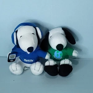 MetLife Peanuts Snoopy Dog Plush Lot Of 2 Cellphone Headphones Save Planet - Picture 1 of 7