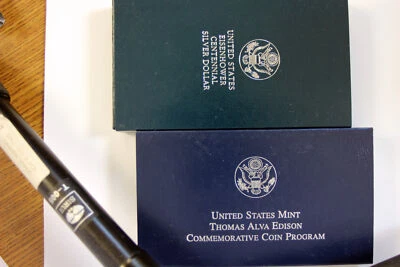 (1) 1990-P Proof Eisenhower Silver $1 & (1) 2004-P Thomas Edison Comm Silver $1 - Image 1 of 4