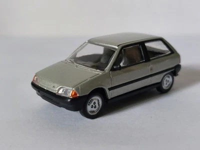 Norev 3 inches . Citroen Ax 1987 Gris Métal 1/64 Neuf Avec Sa boite