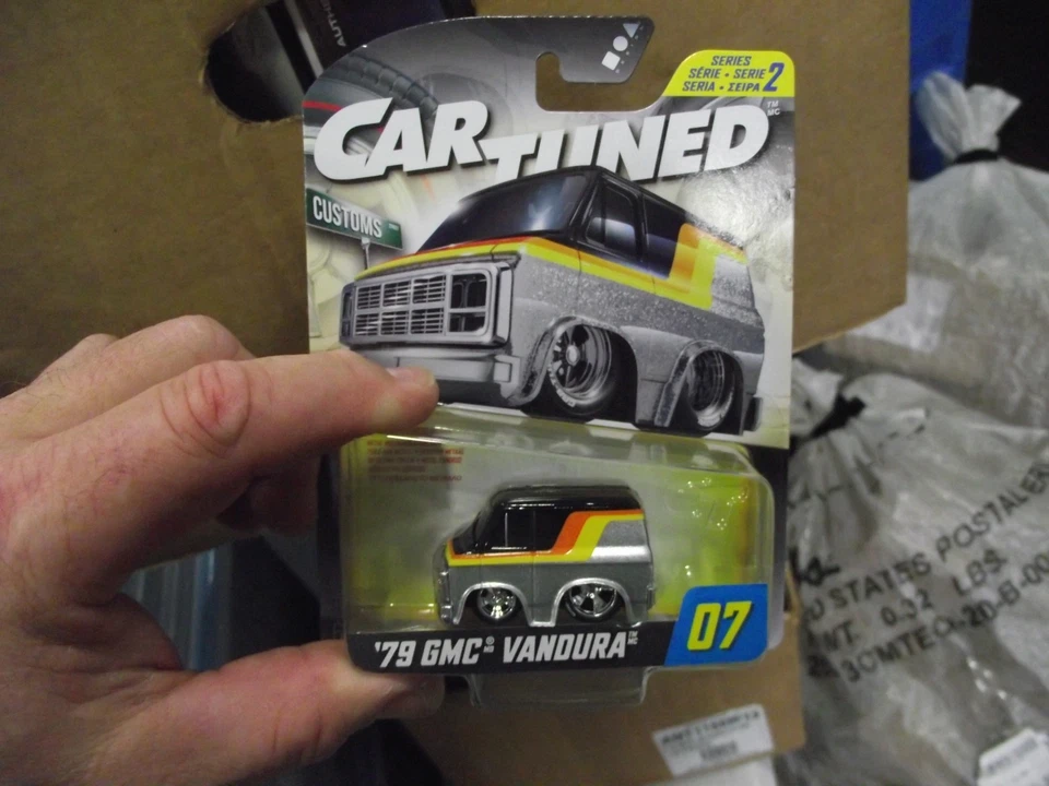 Car Tuned 1/64 79 GMC Vandura silver & black NIB - Image 1 of 1