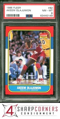 Fleer #82 1986 Akeem Olajuwon RC Rockets Hof PSA 8 Foto 1 de 4