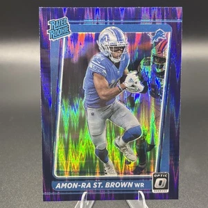Amortiguador púrpura Amon-Ra St. Brown #228 Prizm 2021 Donruss Optic Rated Rookie Lions - Imagen 1 de 2