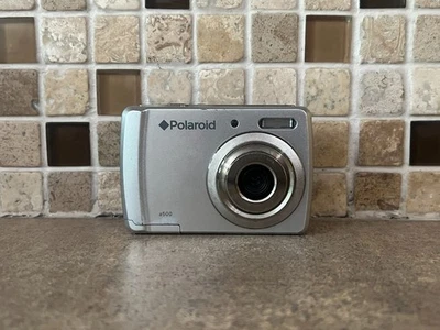 VINTAGE POLAROID A500 5.1MP SILVER FLIP SCREEN DIGITAL CAMERA TESTED AND WORKING - Image 1 of 4