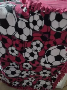 Fleece fabric no sew blanket - Soccer balls on hot pink - Picture 1 of 1