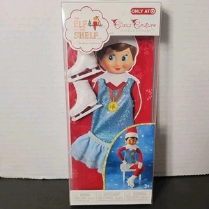 ELF on the SHELF pattini pattinatore su ghiaccio artico medaglia oro abito bersaglio couture - Foto 1 di 3