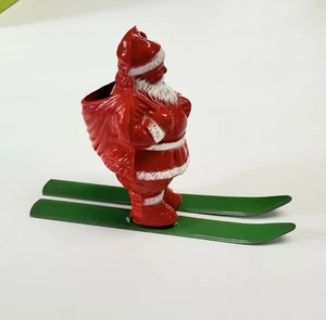 Contenedor de dulces de Navidad vintage Irwin Rosbro Santa Claus con esquís de metal - Imagen 1 de 10