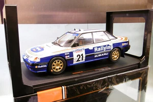 Ixo - SUBARU LEGACY RS #21 RAC Rally 1991 McRae / Ringer 18RMC080B Neuf 1/18 - Foto 1 di 6