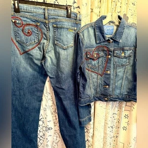 Blaue Jeans von Kippys mit roten Herzakzenten - Bild 1 von 16