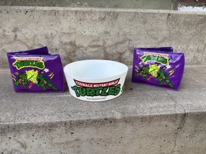 LOTE VINTAGE TMNT CUENCO DE CEREAL Y 2 CARTERAS - Imagen 1 de 16