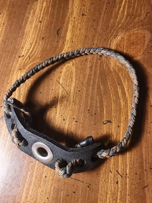 eslinga muñeca tiro con arco Foto 1 de 3