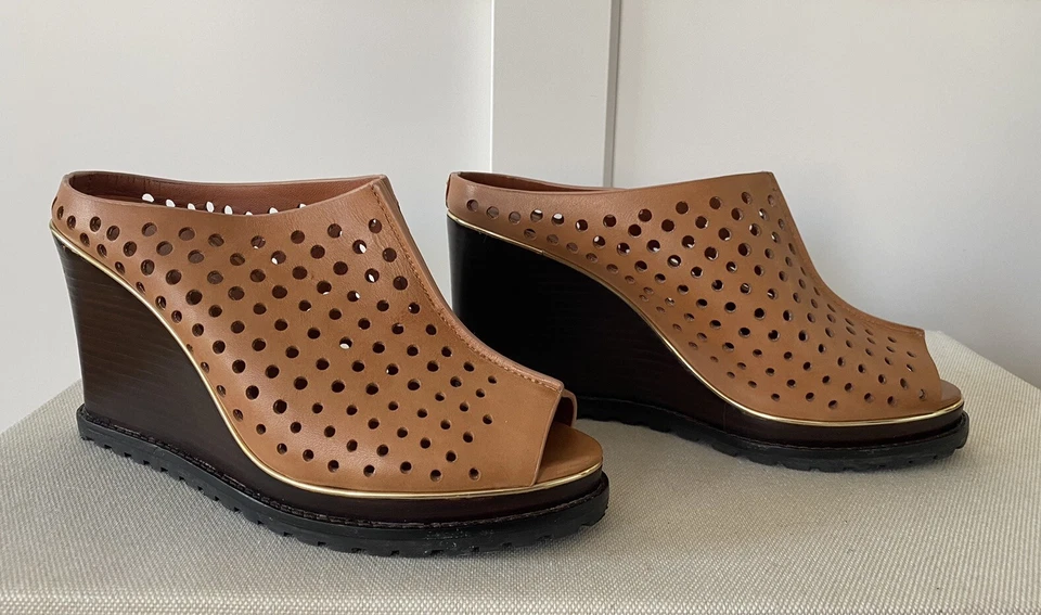 Cuñas de mula recortadas de cuero con punta abierta Rebecca Minkoff marrón talla 7,5 EE. UU. Foto 1 de 4