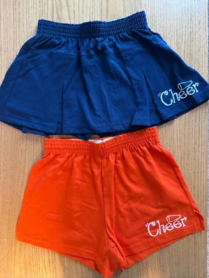 NUEVO Lote de 2 Pantalones Cortos Soffe Naranja y Skort Azul Marino Cheer Youth Grandes (12-14) Foto 1 de 4