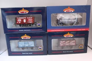 BACHMANN 'OO' GAUGE RAKE OF 4 ASSORTED PLANK WAGONS/VANS - Picture 1 of 6