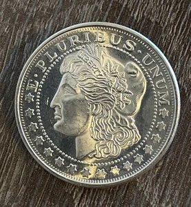 Famoso diseño de dólar Morgan 1 oz plata redonda .999 plata fina troy onza apilable - Imagen 1 de 10