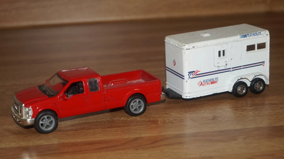 Diecast 2008 Ford F-250 Pickup Truck with 1995 Road Champs Featherlite Trailer - Image 1 of 4
