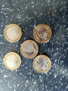 SELTENE £2 PFUND MÜNZEN Insgesamt fünf  - Bild 1 von 3