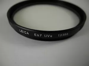 LEICA UVA FILTER 67MM PERFECT MINT PERFECT RIM SILVER SCRIPT #13386 - Bild 1 von 5
