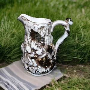 Vintage White Ceramic Pitcher with Embossed Gold Women and Child  7”H - Picture 1 of 7