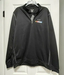 Camisa de viento Oakley Nascar cuarto con cremallera suéter para hombre grande negra - Imagen 1 de 6
