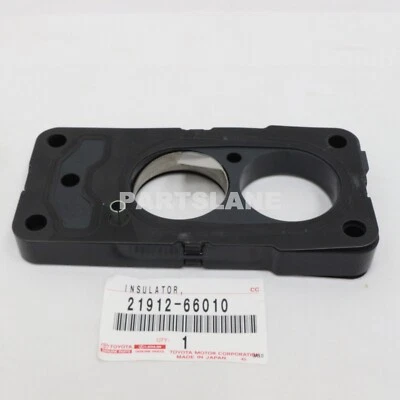 Carburador aislador térmico OEM 21912-66010 Toyota Land Cruiser FZJ70 FZJ75 FZJ80 Foto 1 de 3