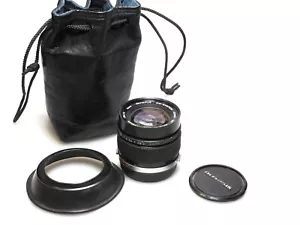 Olympus OM Zuiko MC Auto-W 24 mm f/2 - Foto 1 di 4