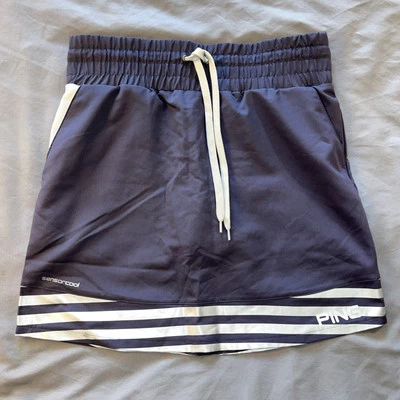 Falda corta de golf Ping Sensor Cool para mujer talla pequeña azul marino con ribete plateado - Nueva Foto 1 de 4