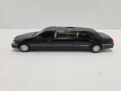 Lincoln Town Car 1999 limusina elástica limusina 1:38 modelo diecast negro Kinsmart Foto 1 de 4