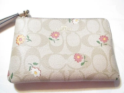 NEW WITH TAG!  $120 COACH CORNER ZIP FLORAL "C" LIGHT KHAKHI MULTI WRISLET - Image 1 of 4