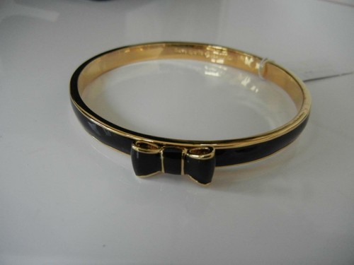 BRACCIALE NUOVO CON ETICHETTE KATE SPADE TAKE A BOW ORO SMALTO NERO PLACCATO ORO 12K