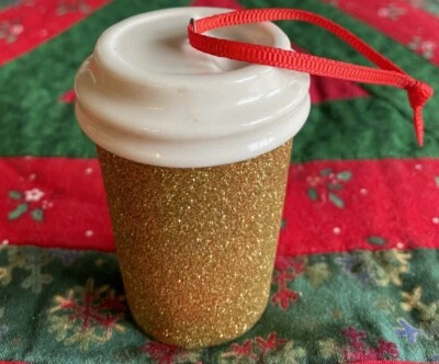 Ornamento de Natal de porcelana glitter dourado Starbucks 2018 - Imagem 1 de 4