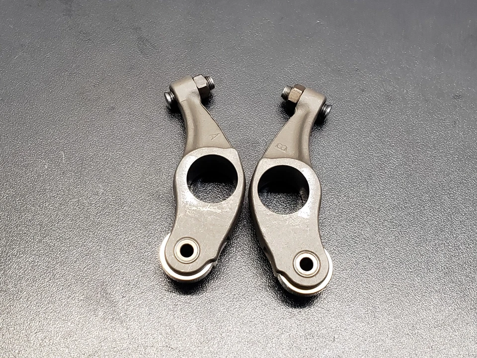 2003 - 2008 Honda Pilot Rear Exhaust Rocker Arm OEM 14626-P8A-A00 14627-P8A-A00 - Image 1 of 4