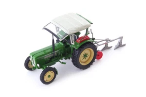 Schlüter S450 grün + Silberpflug - 1:43 - Autocult (90152) - Bild 1 von 2